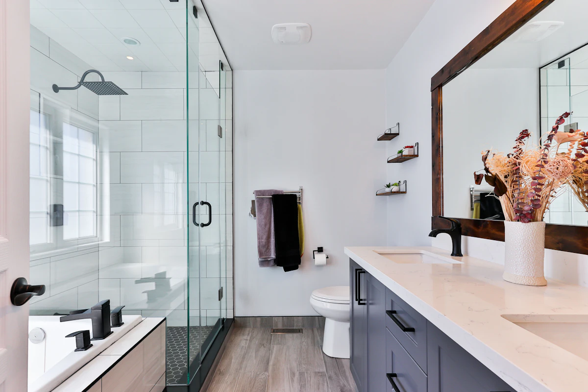 Clean, bright bathroom with a freestanding bathtub and glass shower